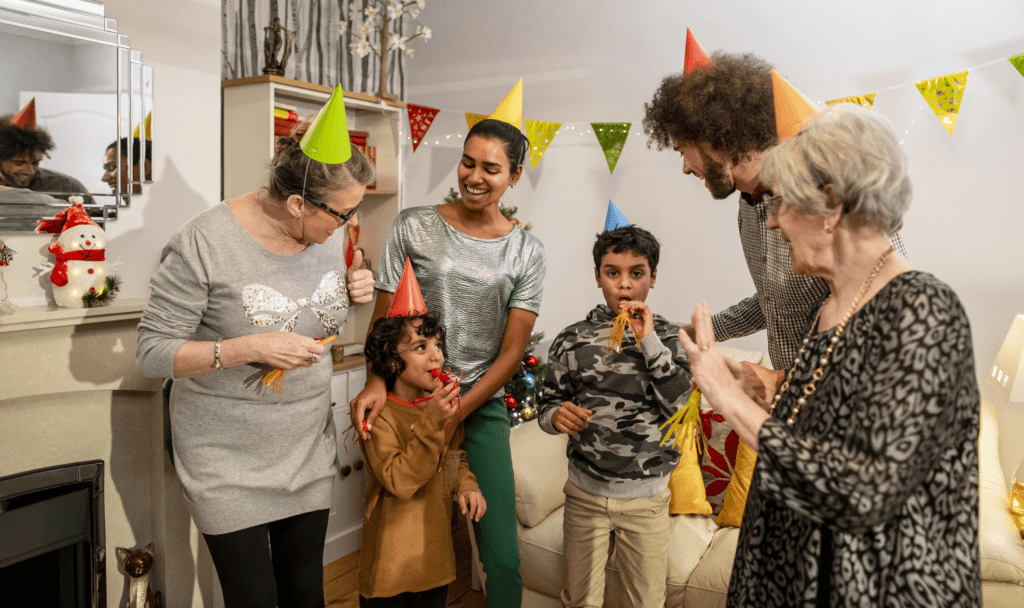 Parents and children exchanging New Year blessings at home