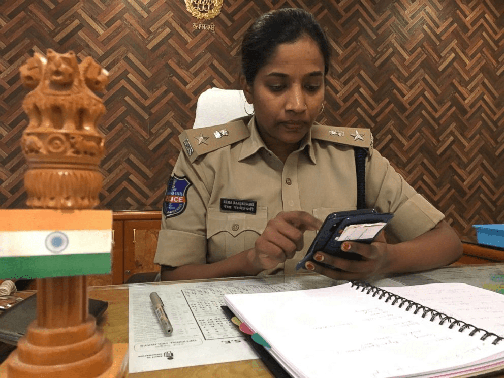 Standard police verification involving document checks rather than physical scanning gestures