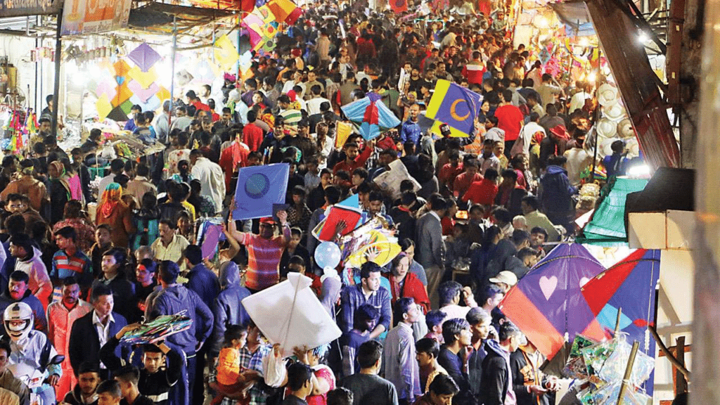 Colorful kites filling sky during Makar Sankranti community celebration