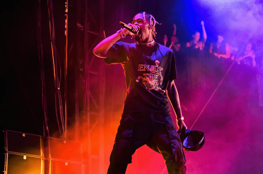 Travis Scott commanding crowd through high energy setlist performance