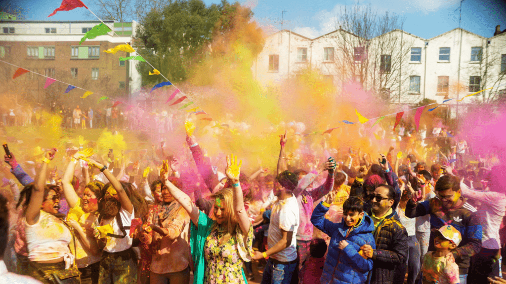 Families celebrating Holi responsibly within residential communities